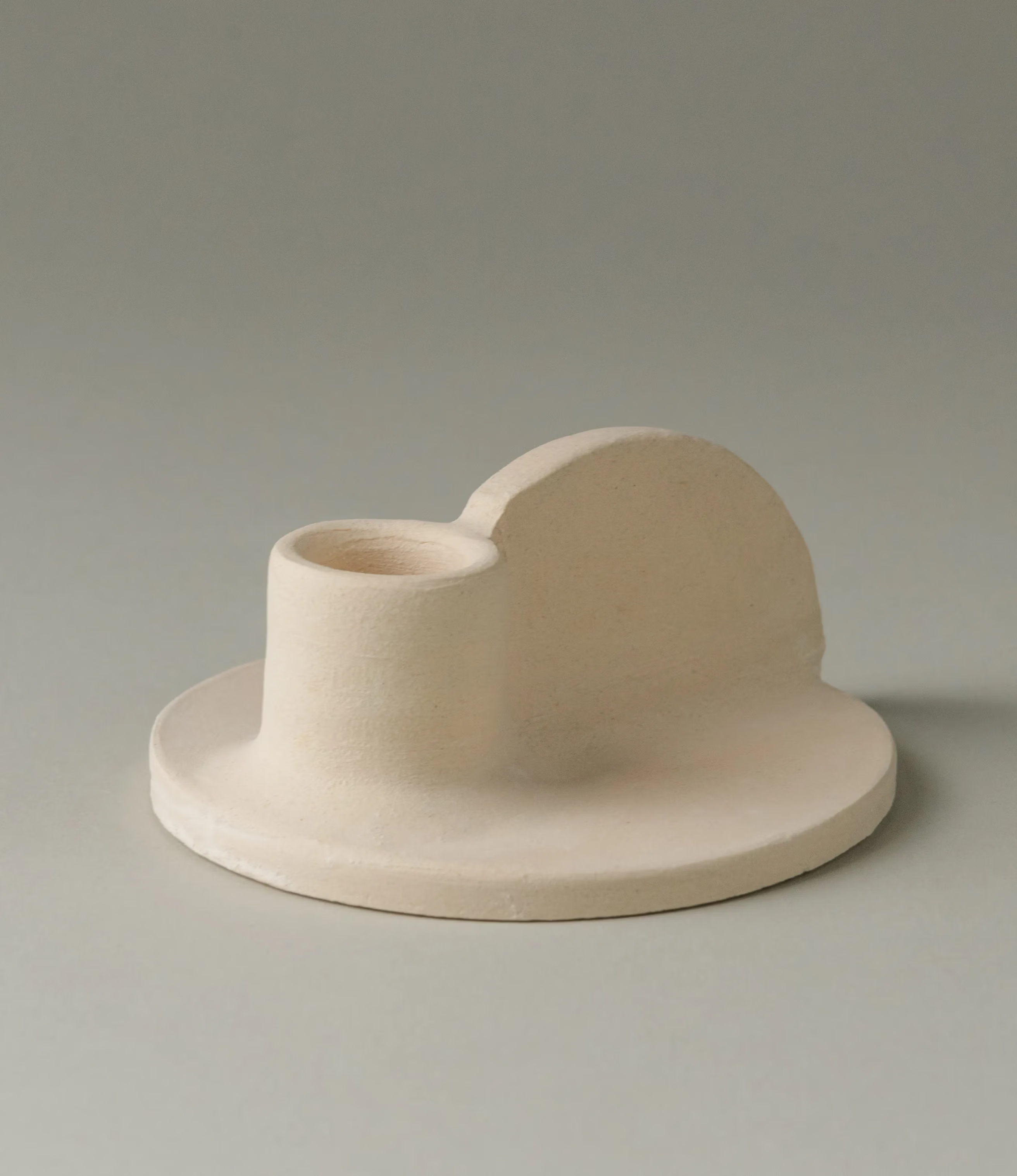 Myrtha Candle Holder is created by Alfareria La Nava. The product comes in a cream color and it has a natural matte finishing. 