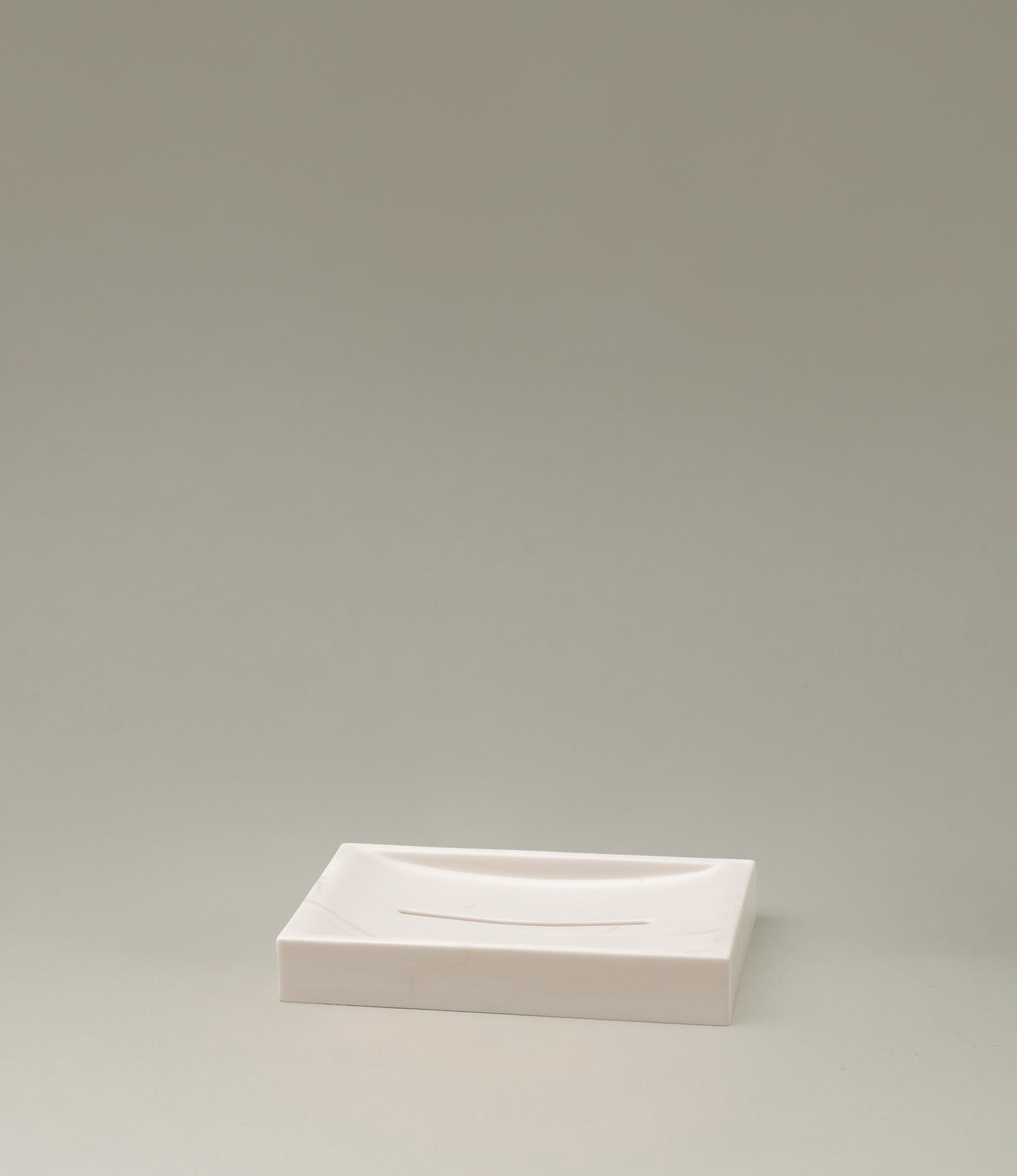 Marble Soap dish from Azur Natural BodyCare. The dish has a subtle rose marble effect on an ivory base. The dish is a great addition to any of our soaps.