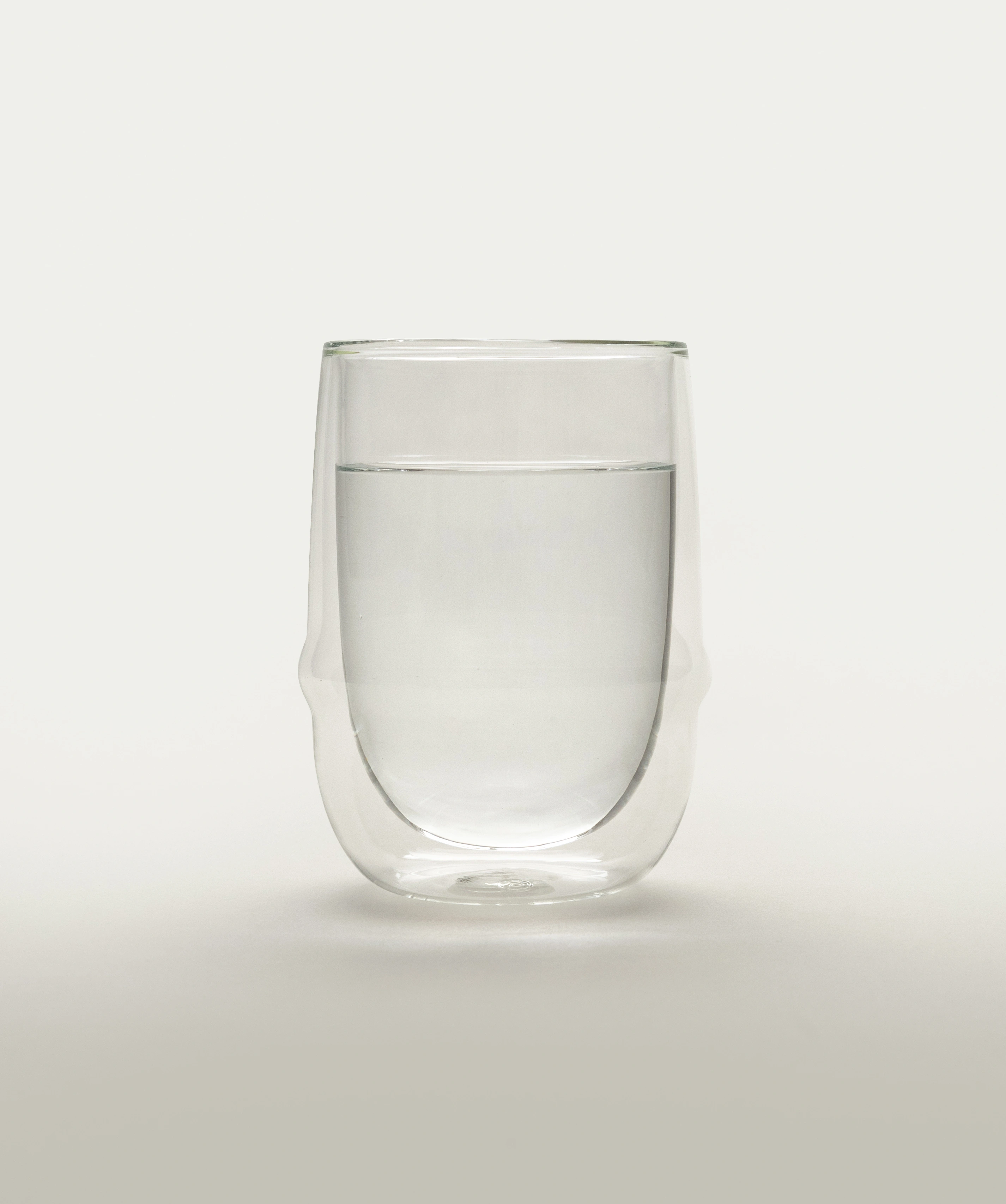 Kronos Iced Tea Glass from the Japanese brand called Kinto. The glass is double walled and perfectly clear. The glass can hold 350ml of liquid.