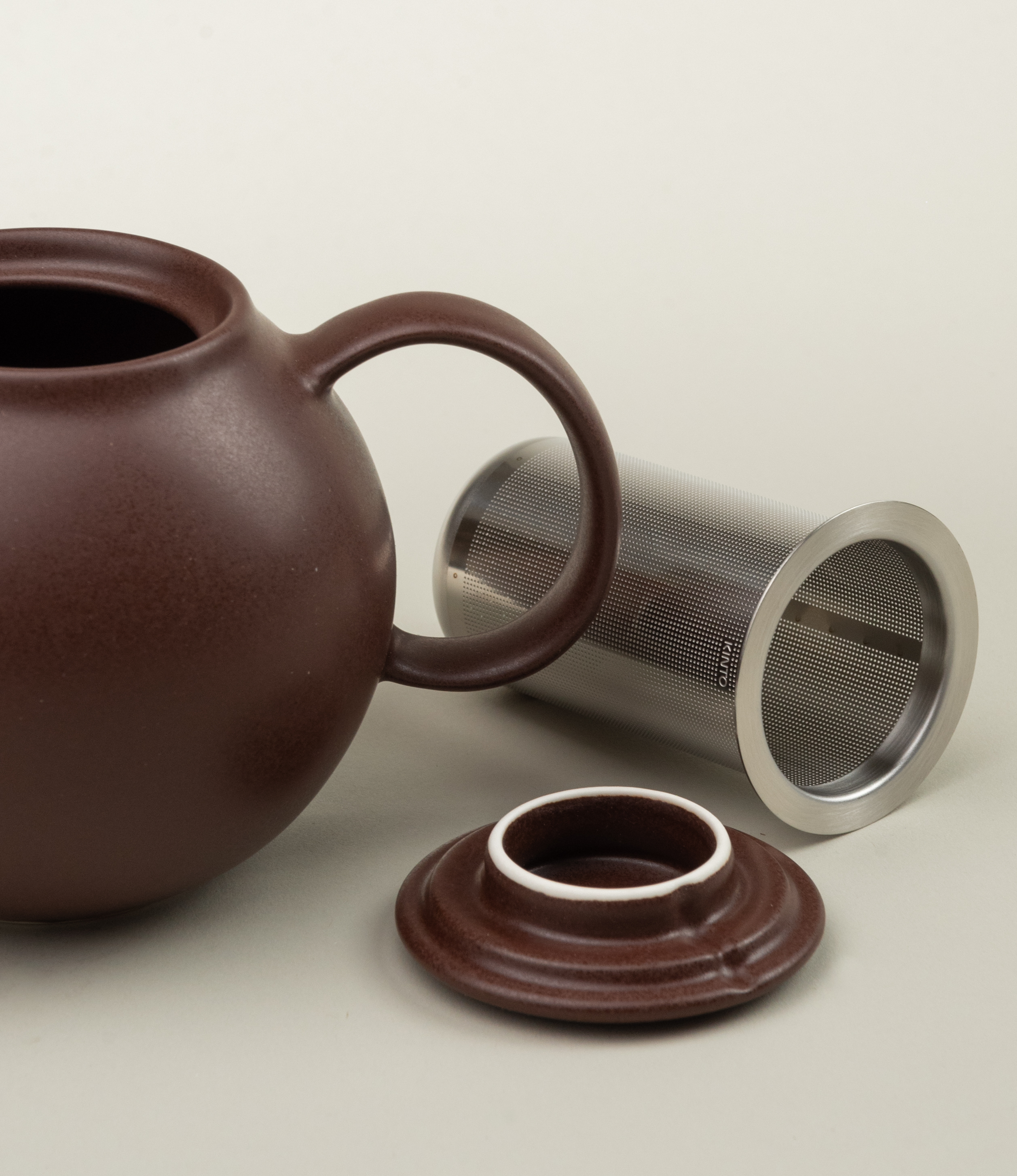 Pebble Tea Pot from the japanese brand Kinto is a small sized item. It can hold 500ml of liquid. This item comes in the dark chocolate brown color.