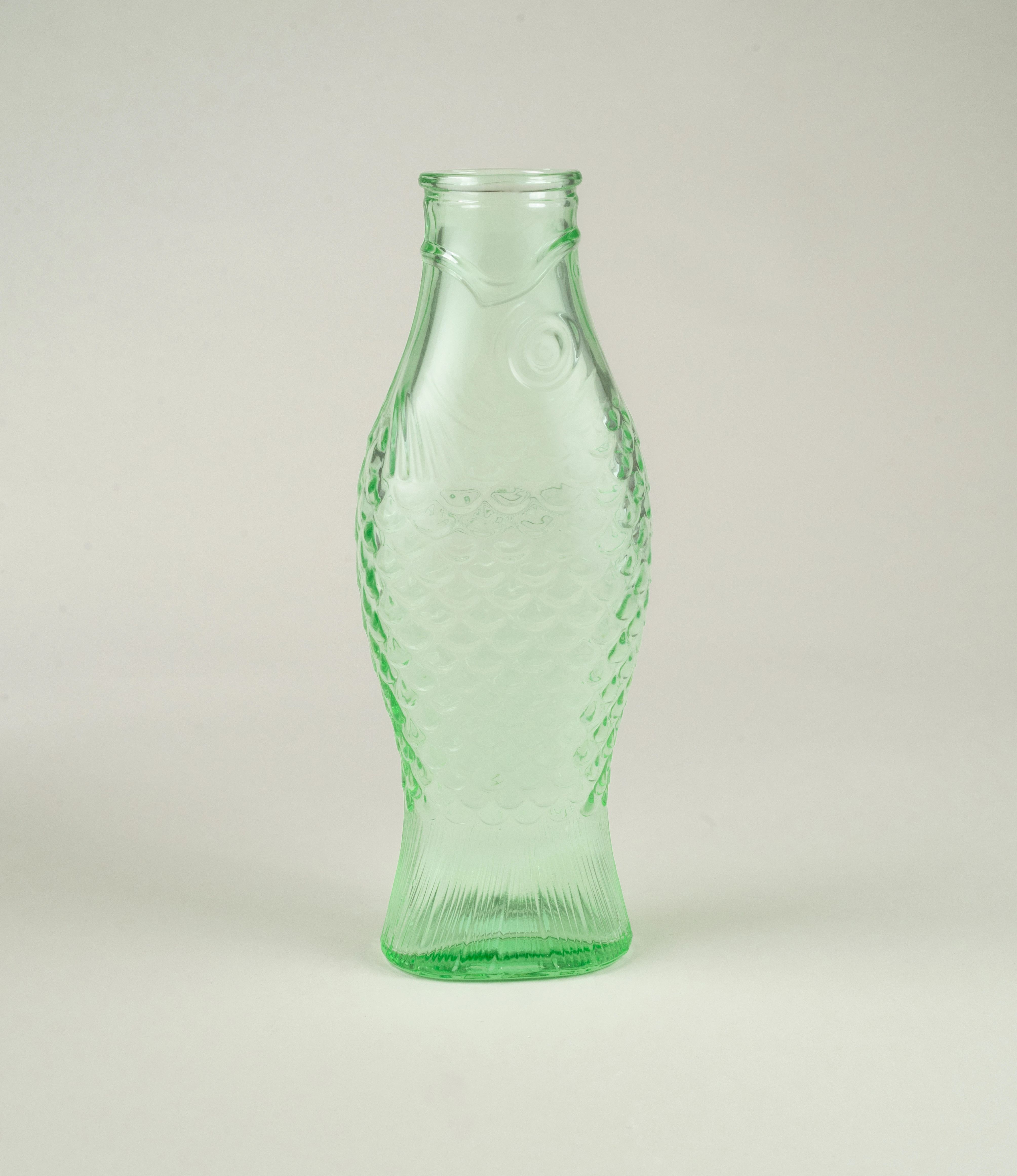 Carafe Green Fish is a decanter from Serax. The green glass has a shape of a fish.