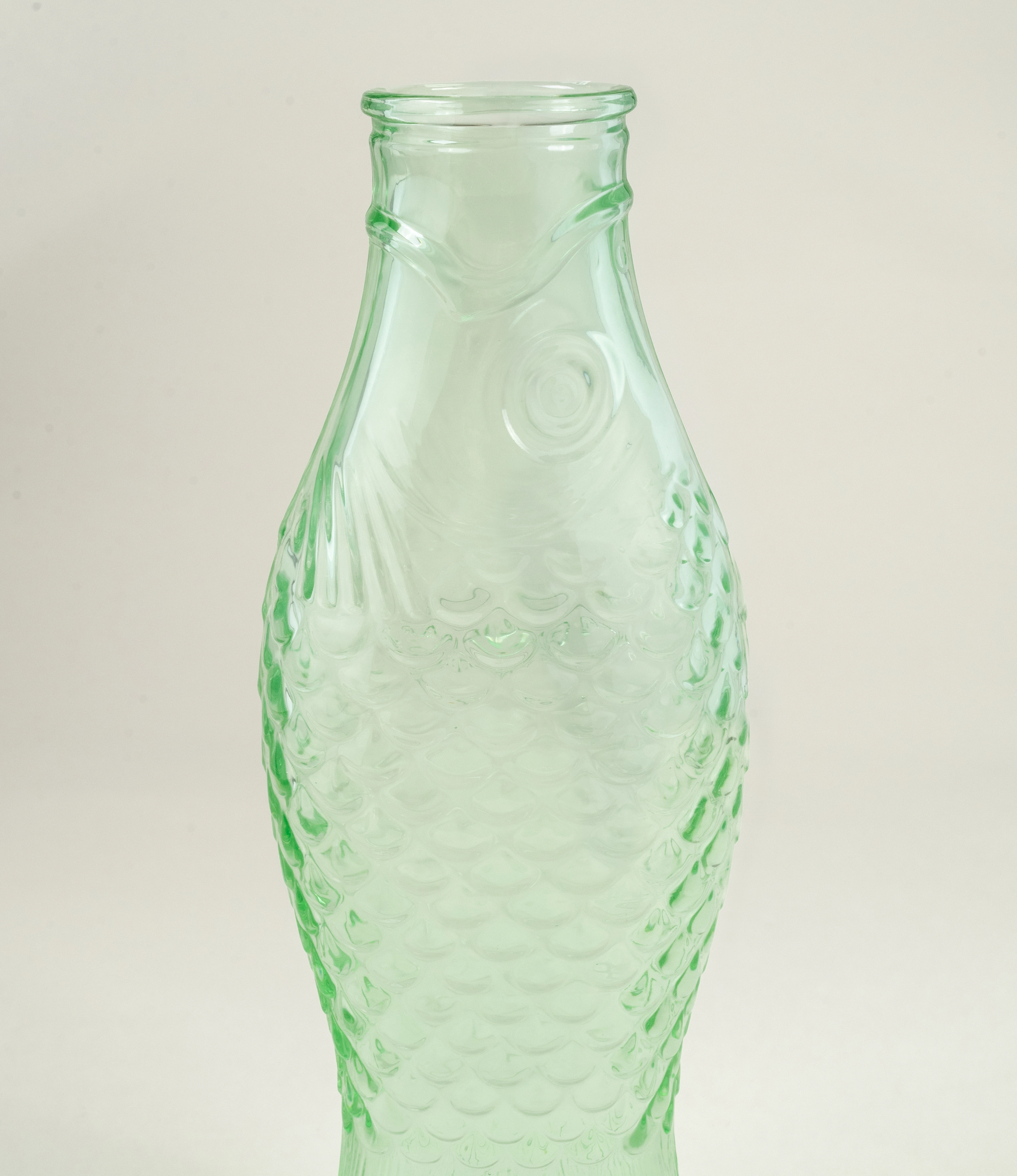 Carafe Green Fish is a decanter from Serax. The green glass has a shape of a fish.