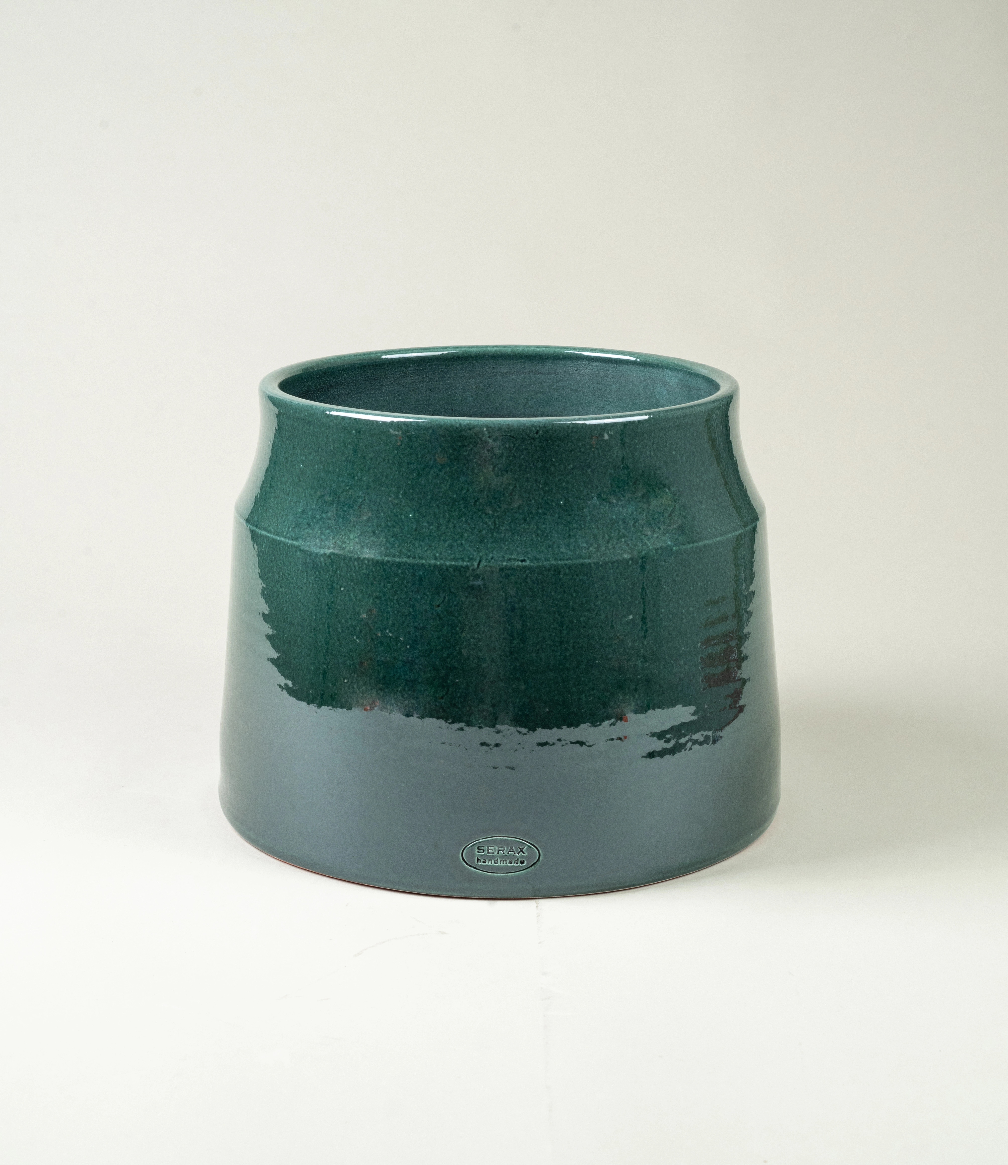 Dark Green Planter from Serax is a large ceramic plant pot.