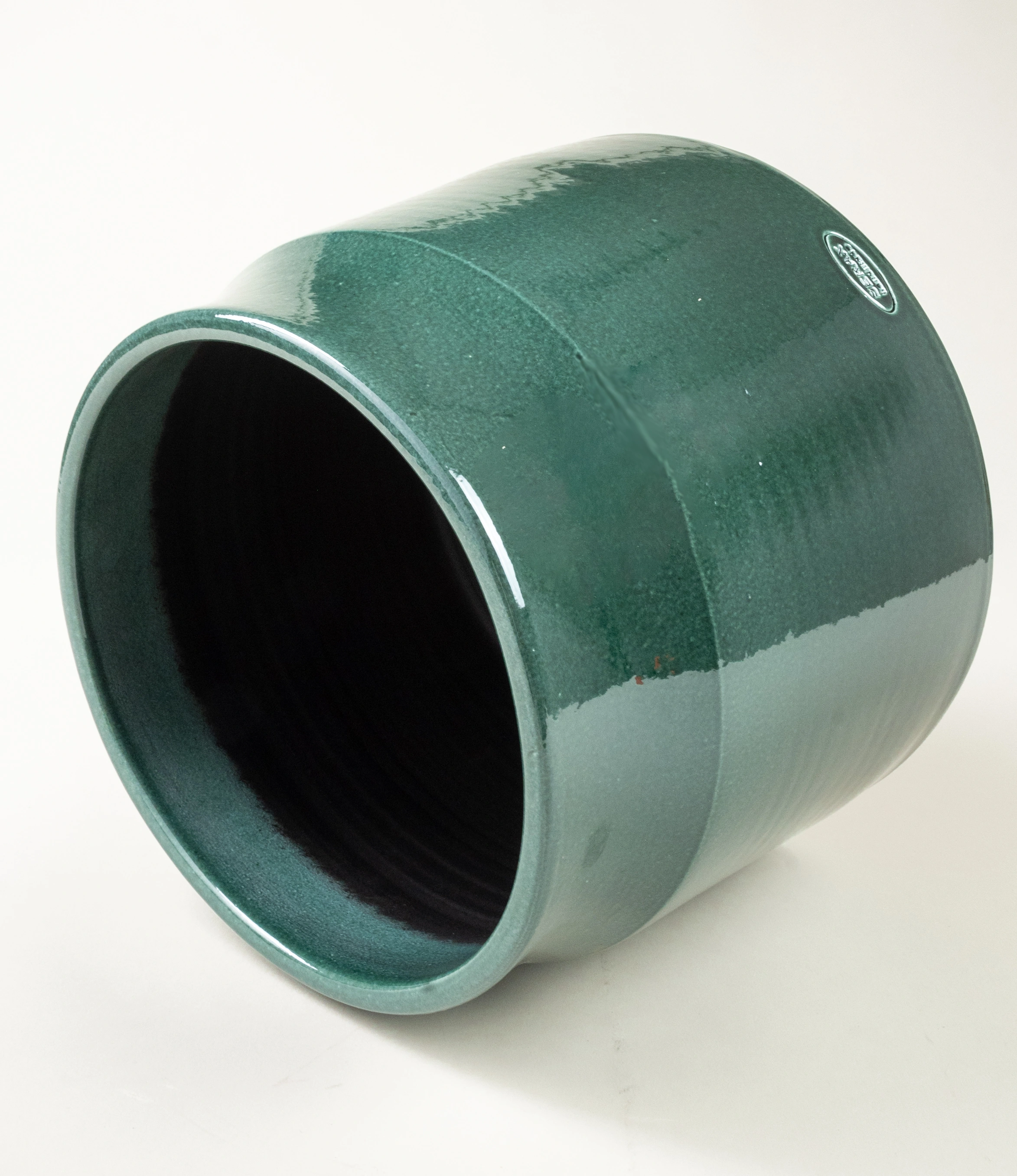 Dark Green Planter from Serax is a large ceramic plant pot.