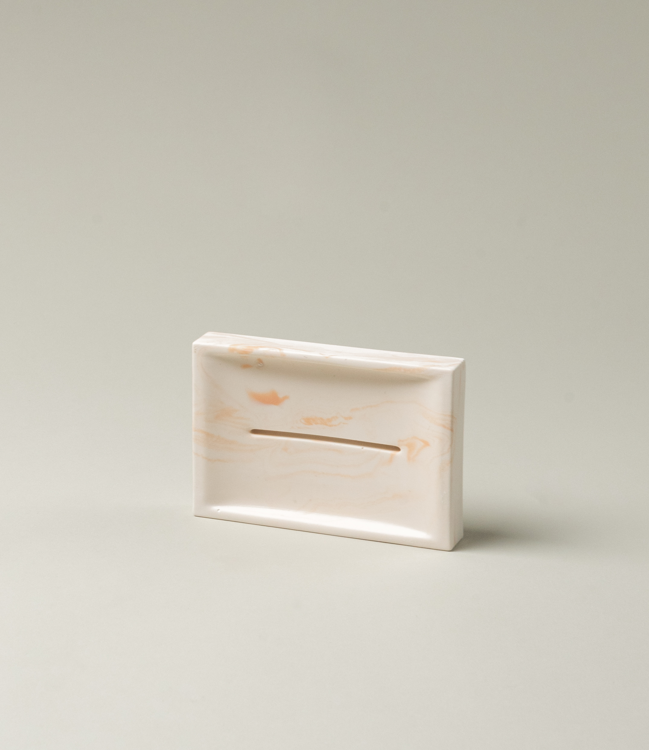 Marble Soap dish from Azur Natural BodyCare. The dish has a subtle rose marble effect on an ivory base. The dish is a great addition to any of our soaps.