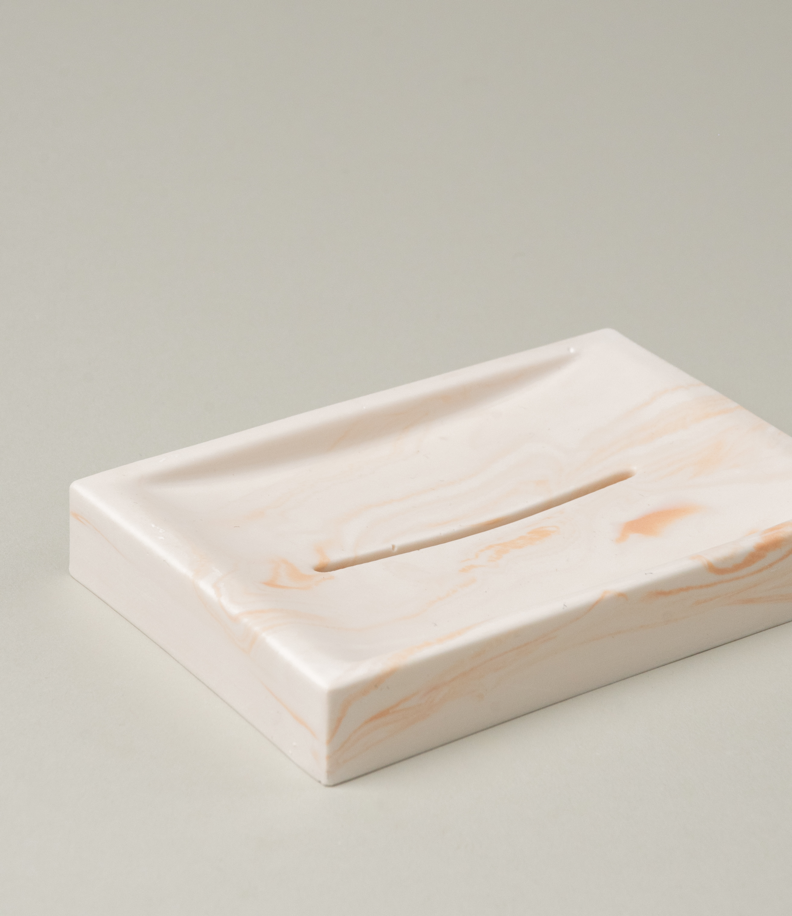 Marble Soap dish from Azur Natural BodyCare. The dish has a subtle rose marble effect on an ivory base. The dish is a great addition to any of our soaps.