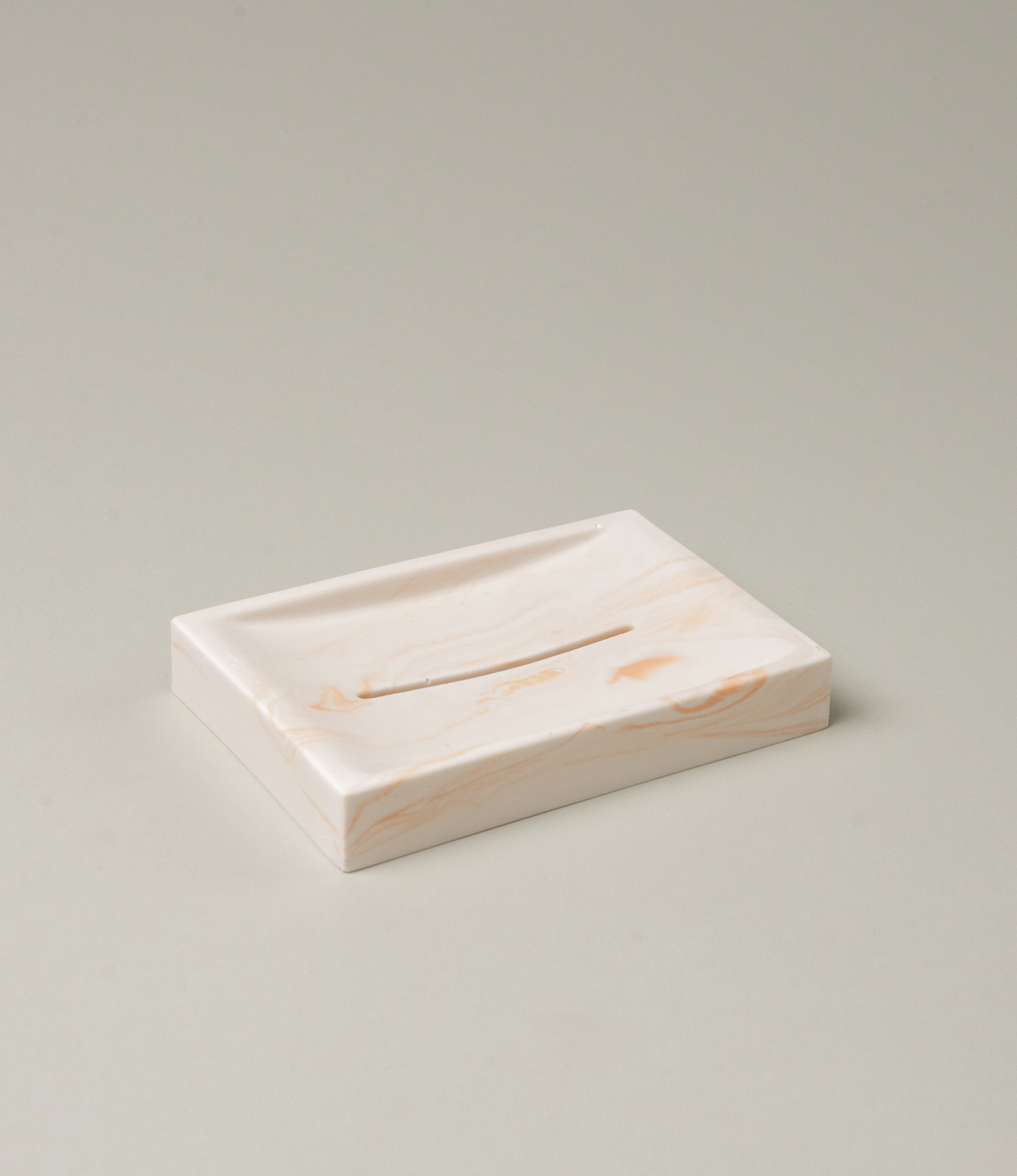 Marble Soap dish from Azur Natural BodyCare. The dish has a subtle rose marble effect on an ivory base. The dish is a great addition to any of our soaps.