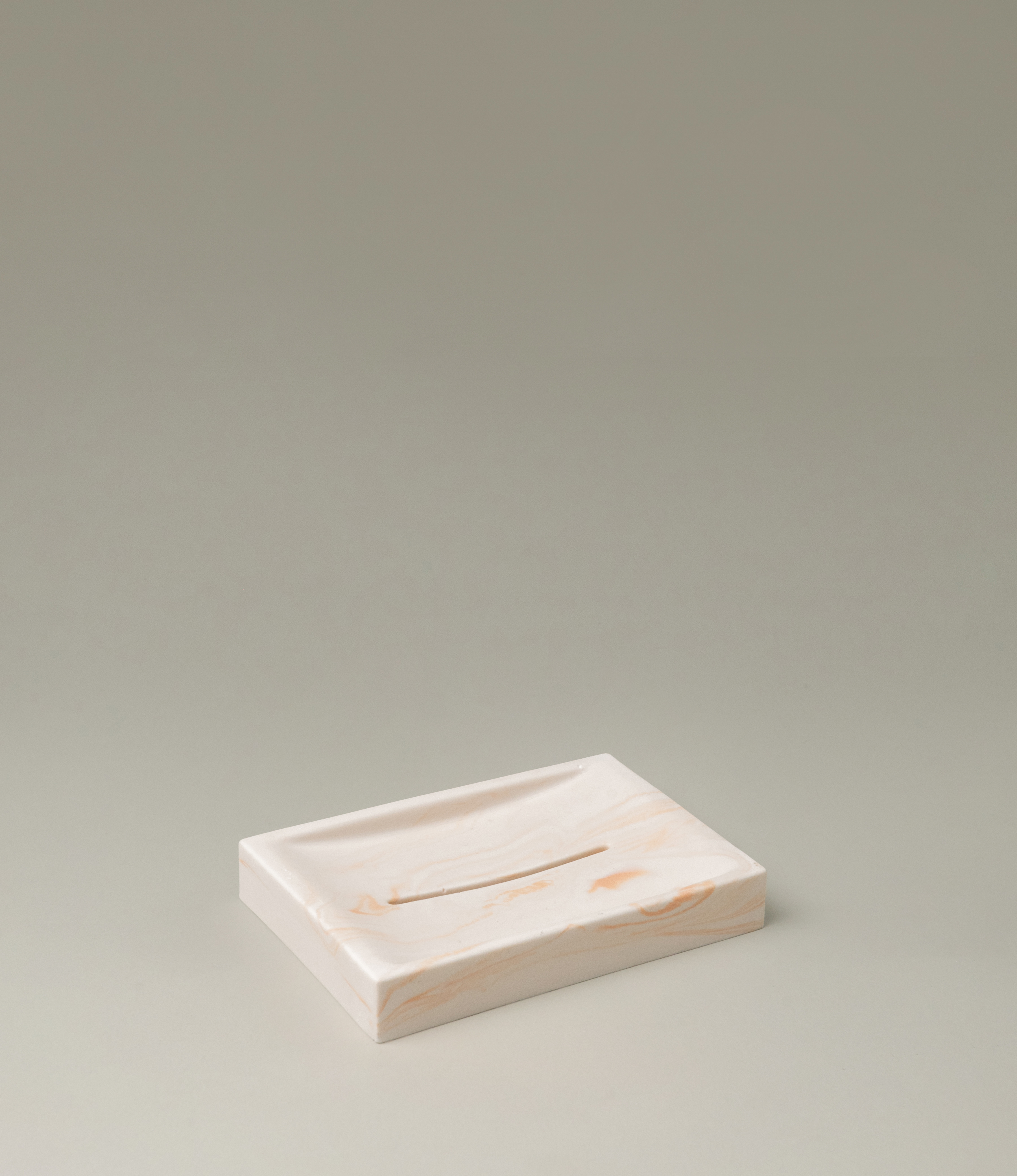 Marble Soap dish from Azur Natural BodyCare. The dish has a subtle rose marble effect on an ivory base. The dish is a great addition to any of our soaps.