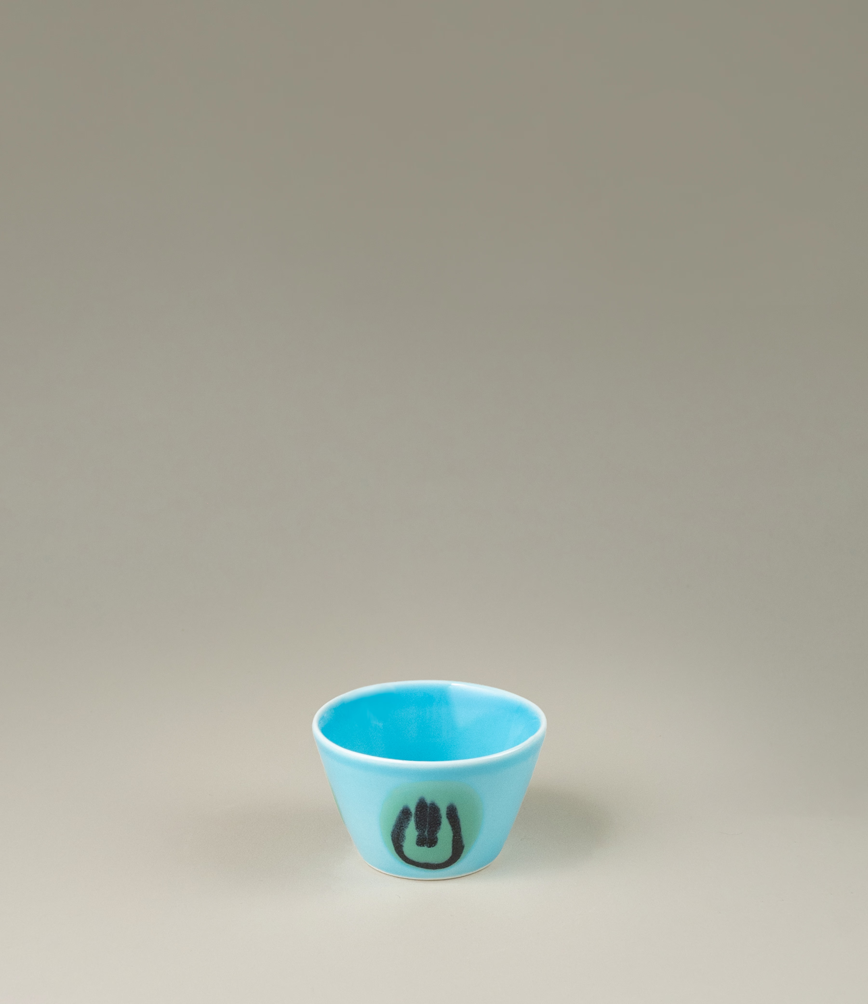 Super Cup Kawaii Cup Set is a perfect fit for your maximalist home. The cups come in the unique Blue Alien variant, a blue color base with green smileys. The item is the perfect size for an espresso.