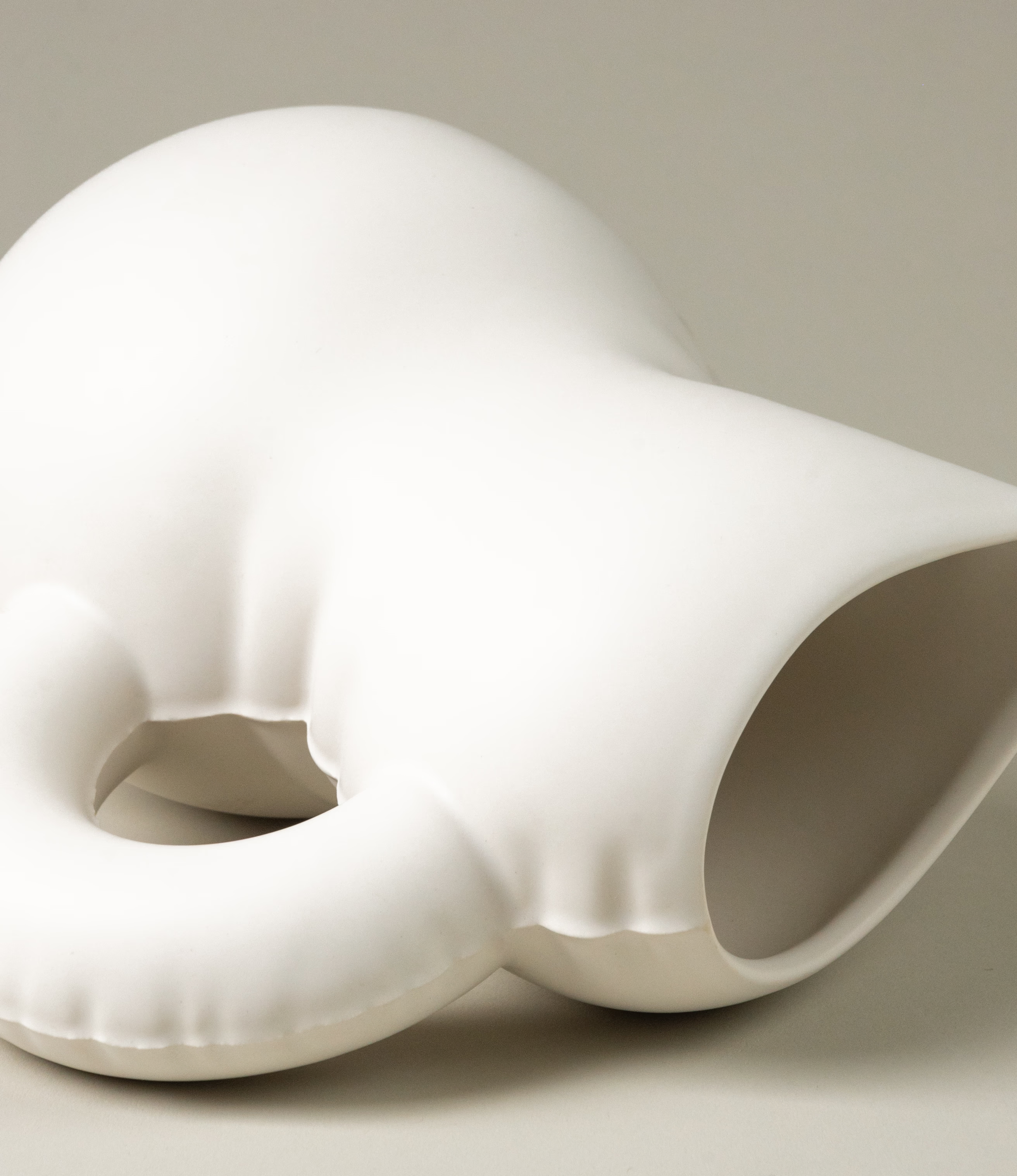 A closeup of the jug called 'Emily' from Homestudyo comes in the soothing bone color. The product looks like an inflated balloon but was made from ceramic.