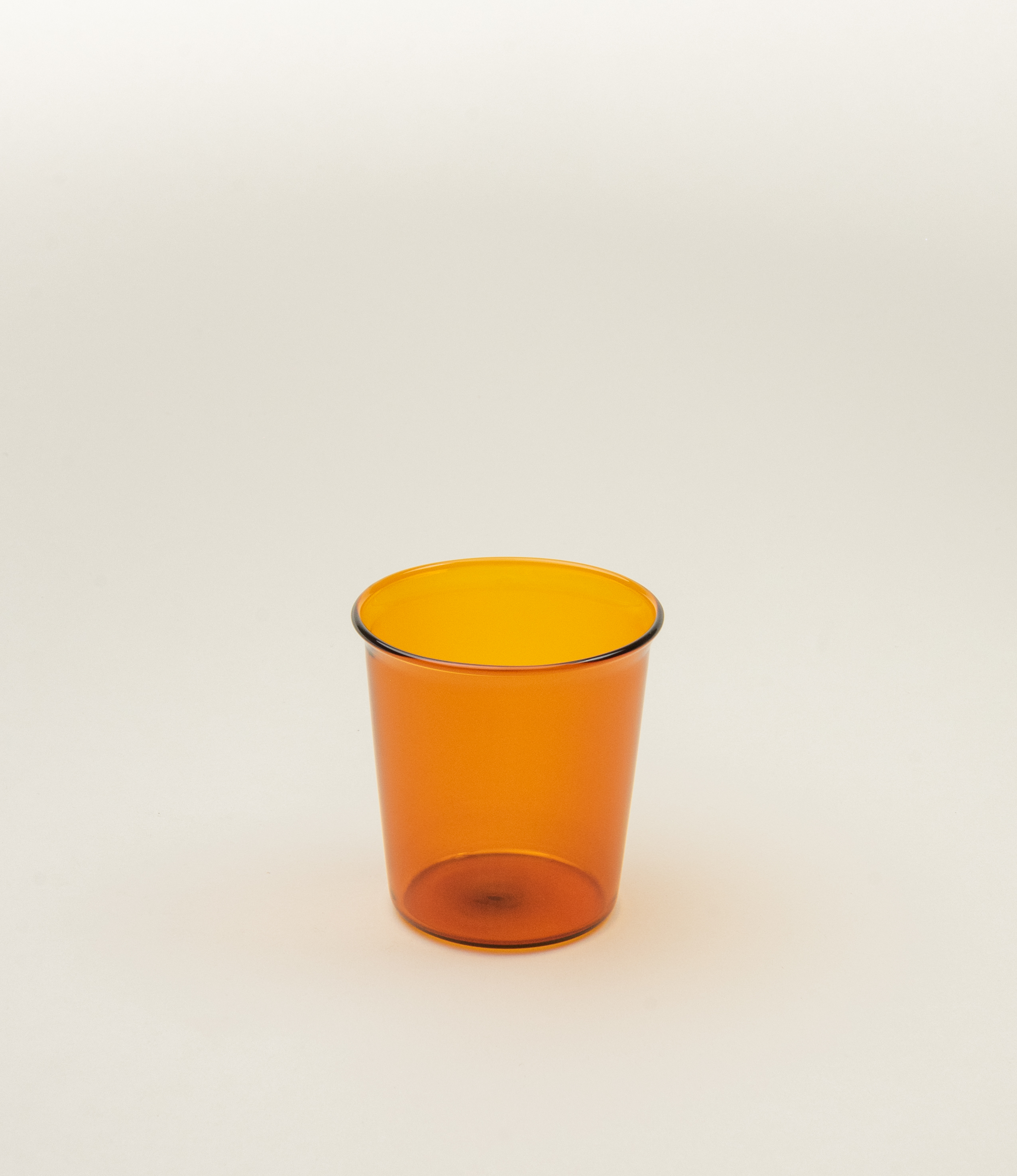 Cast Amber Glass from Kinto. The tip of the glass turns slightly outwards which makes drinking even more comfortable.