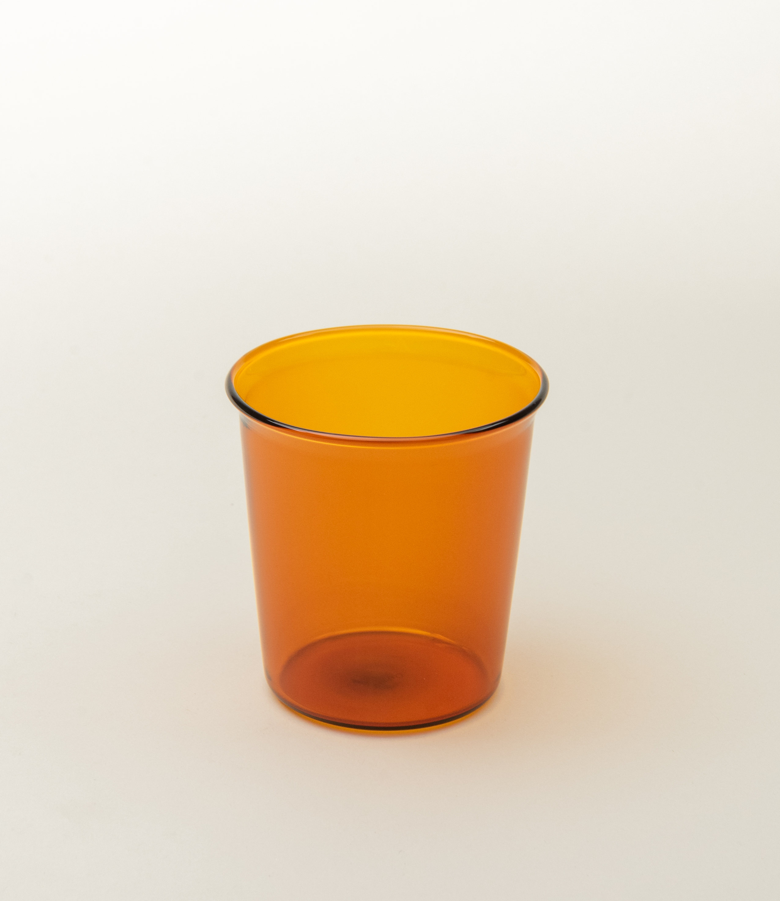 Cast Amber Glass from Kinto. The tip of the glass turns slightly outwards which makes drinking even more comfortable.