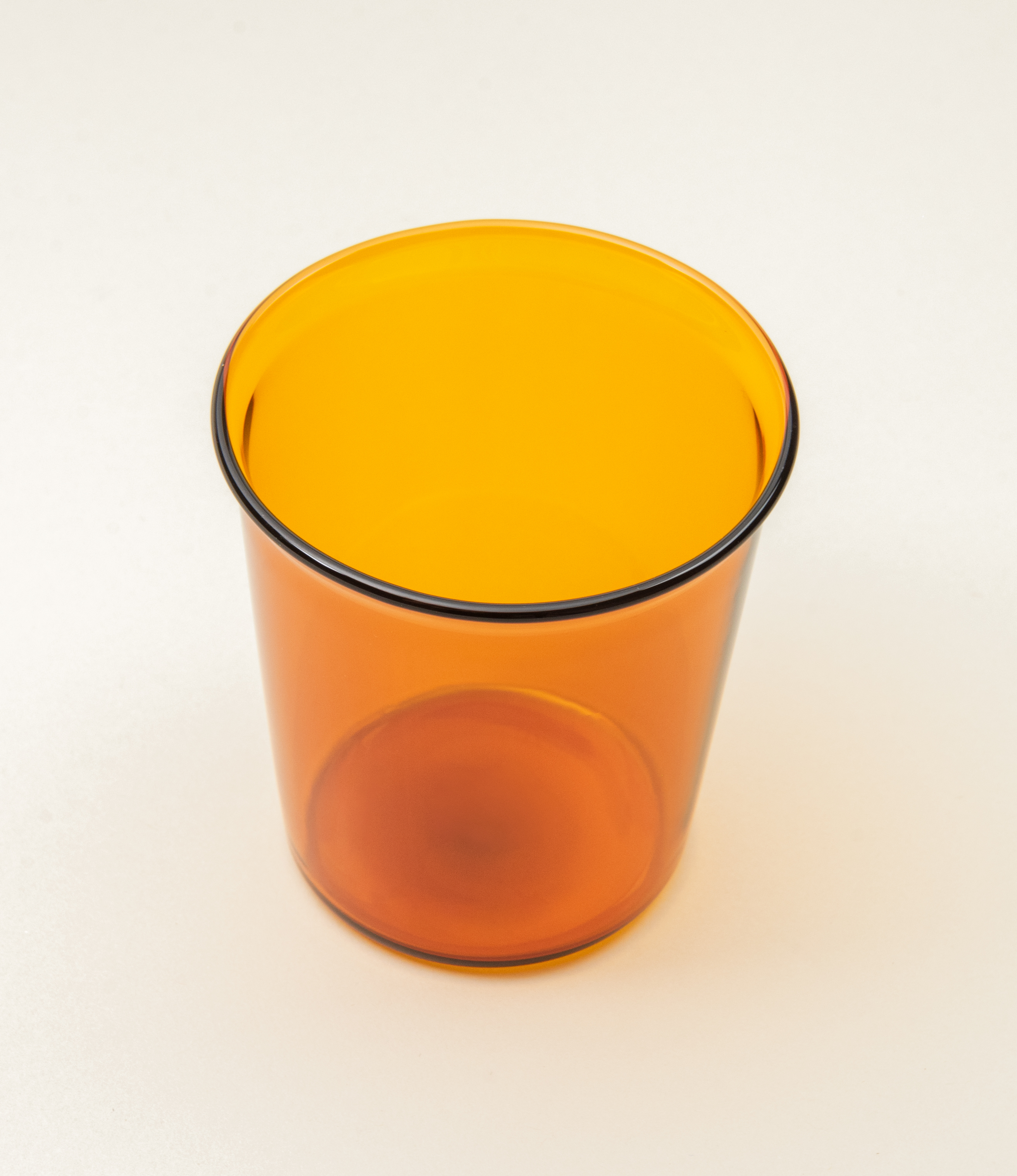 Cast Amber Glass from Kinto. The tip of the glass turns slightly outwards which makes drinking even more comfortable.