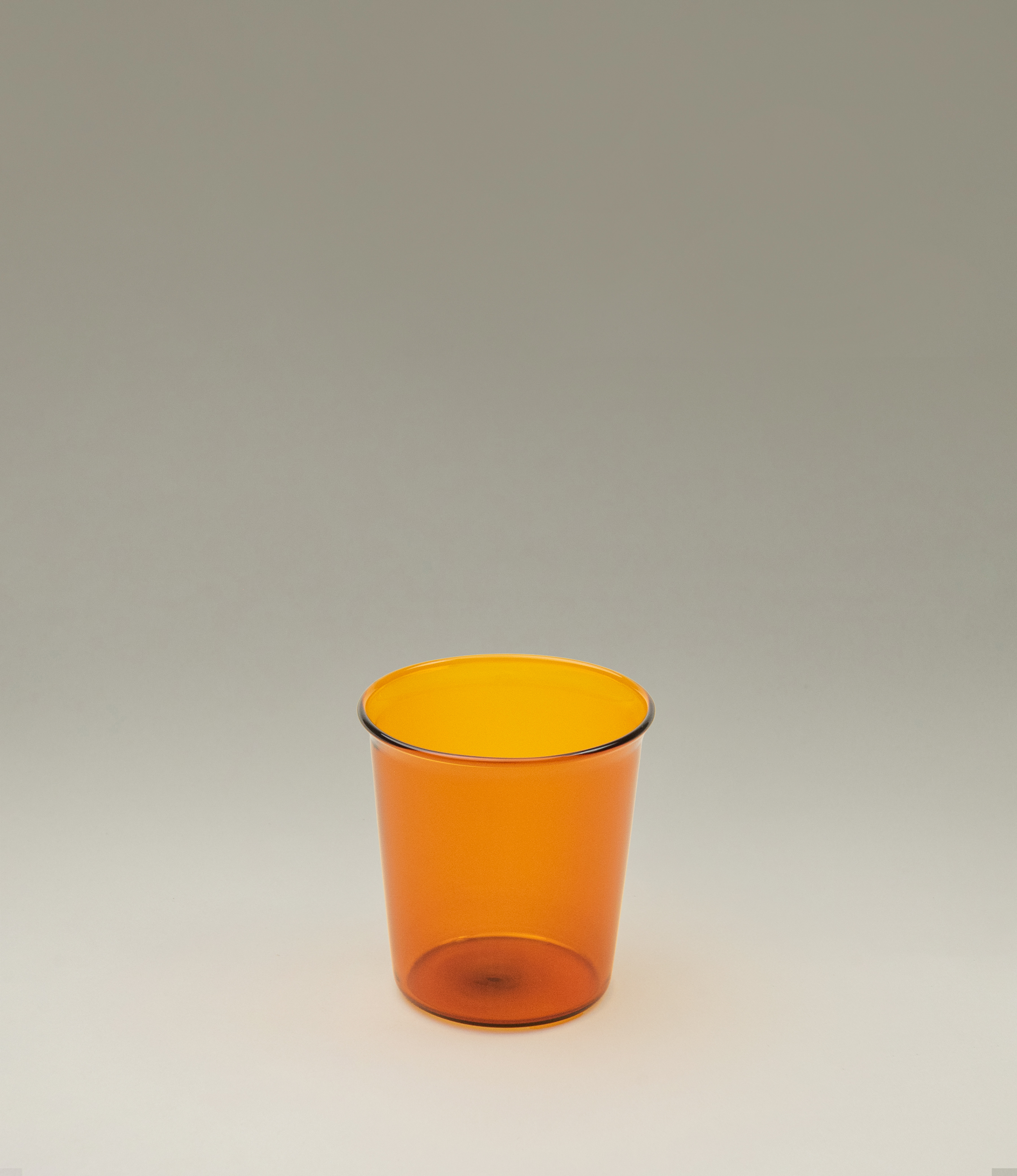 Cast Amber Glass from Kinto. The tip of the glass turns slightly outwards which makes drinking even more comfortable.