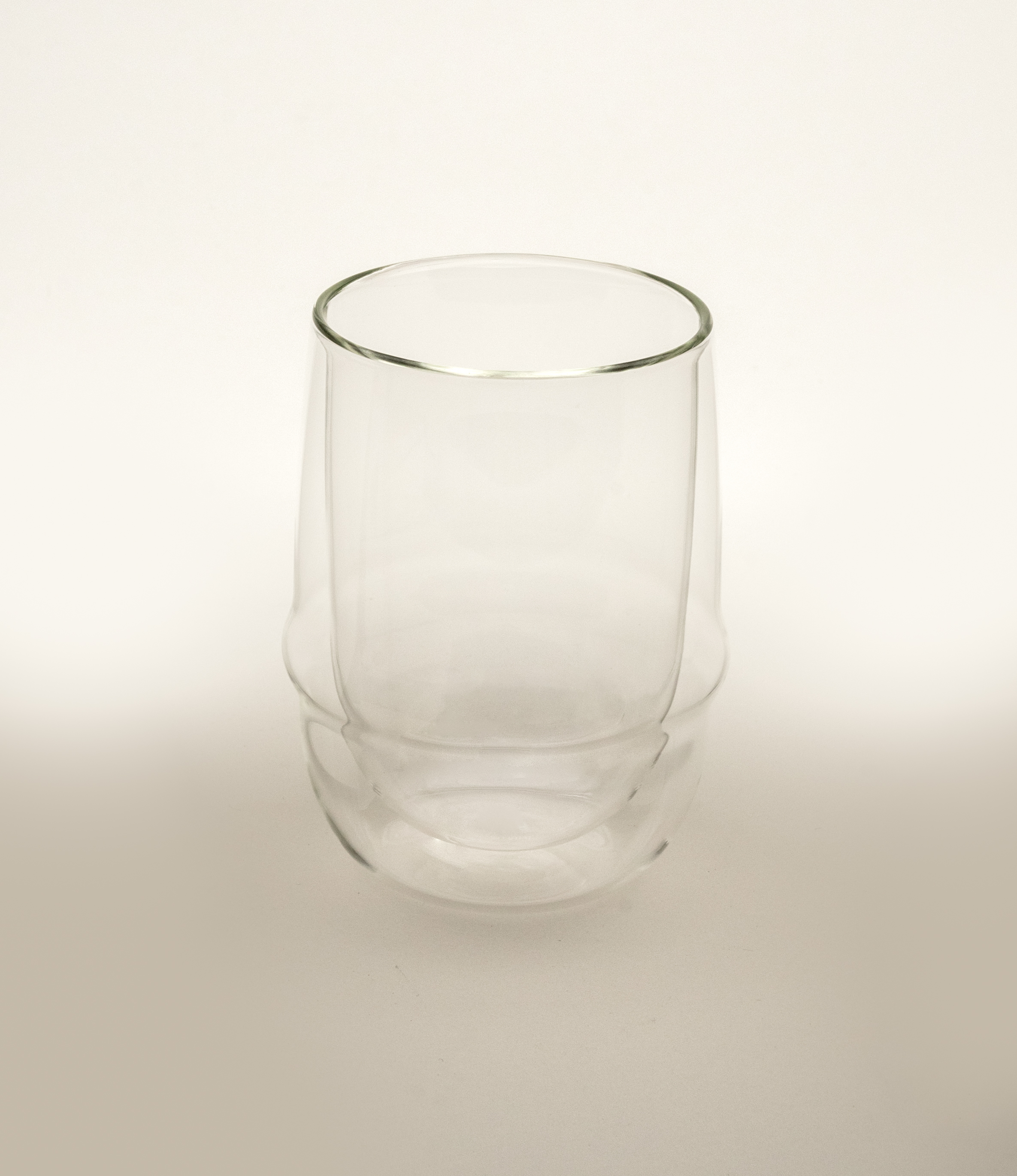 Kronos Iced Tea Glass from the Japanese brand called Kinto. The glass is double walled and perfectly clear. The glass can hold 350ml of liquid.