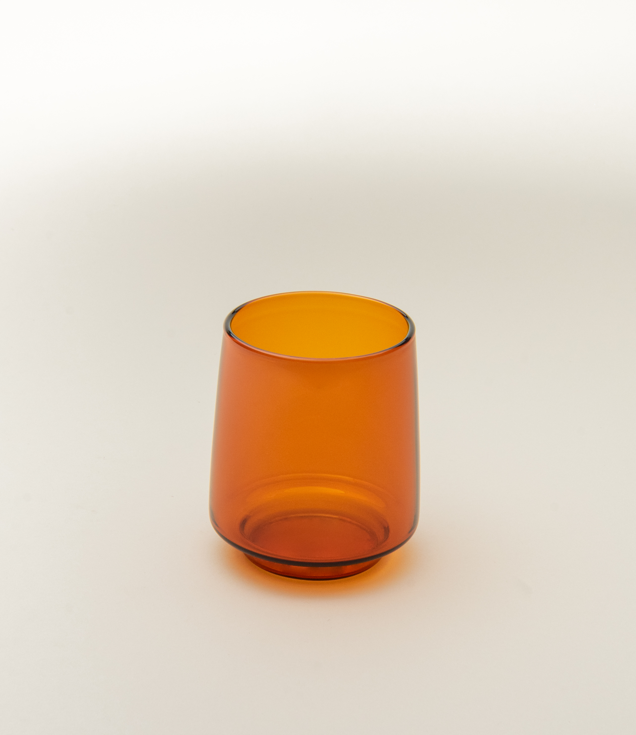 Sepia Tumbler is a glass item from the japanese brand Kinto. The product was made to hold your favorite beverages up to 370 ml. The item has the nostalgic amber color.